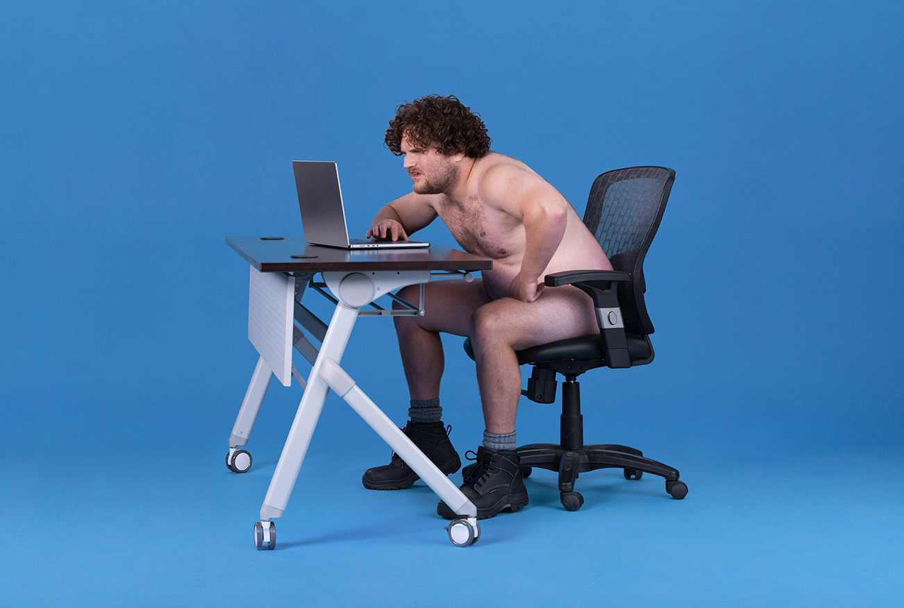 naked man at desk 1